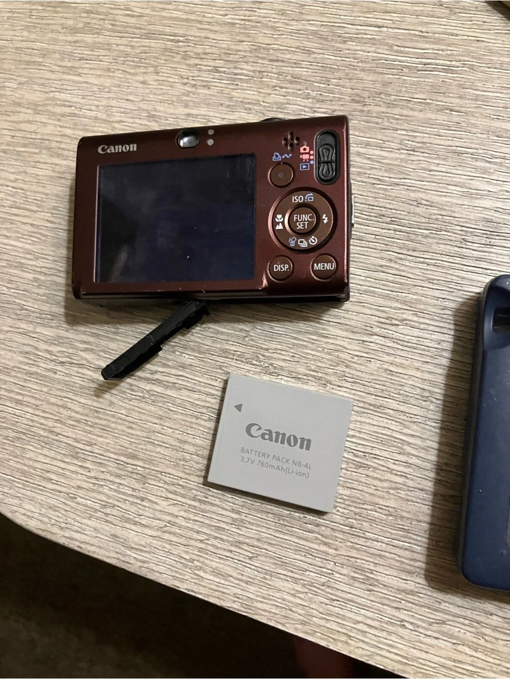 Canon PowerShot SD1100 IS Compact Red Camera with Navy Canon Battery Charger